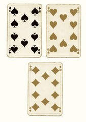 A hand of vintage playing cards in sepia isolated on a white background.
