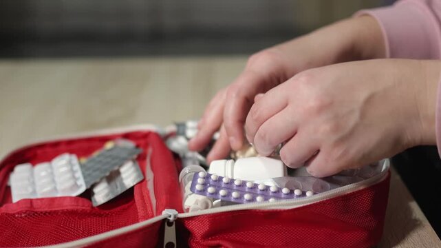 First aid kit. Medicine pills. Slow Motion Video. High Quality 4k Footage