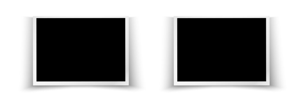 Two empty white photo frames with soft shadow on black background, realistic mockup for photo or artwork presentation, modern minimal layout with space for images.