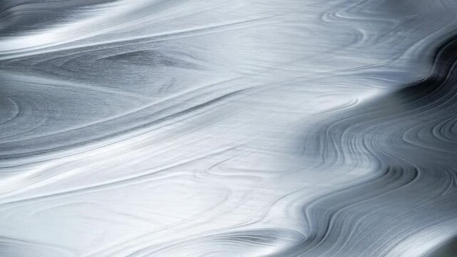 Abstract silver waves with smooth textures creating a sense of fluidity and elegance. Ideal for backgrounds in modern design and artistic projects