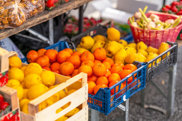 Fresh citrus fruits at outdoor market stand