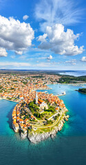 Aerial view of the old city of Rovinj, Croatia. Vertical travel background