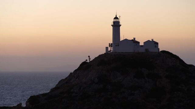 Evening time at Knidos lighthouse ( Turkish; Deveboynu Feneri ) - Dat&ccedil;a district, Mugla province, Turkey. 4k video 
