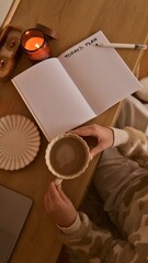 Cozy morning routine with coffee and planning the day ahead