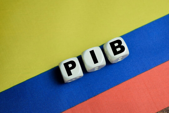 Concept of Colombia economy. text PIB - Producto Interior Bruto it means Gross Domestic Product on wooden blocks.