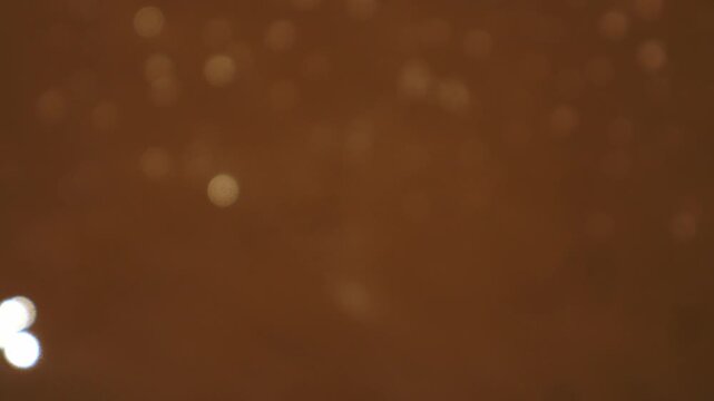 Abstract sun reflections on water surface creating soft sparkle and tranquil nature mood for mindfulness concept.
