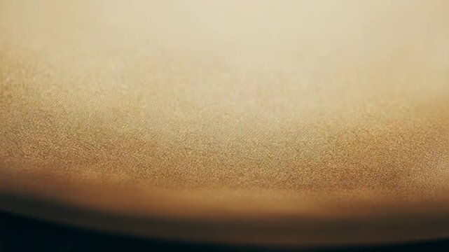 Gradient background featuring a soft blend of warm, earthy brown tones transitioning from light pastel beige to deeper hues, creating an organic and subtle texture for creative design