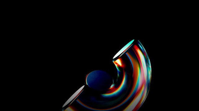Three abstract cylindrical objects with reflective surfaces and intense rainbow-like lighting set against a solid black background creating a high contrast visual