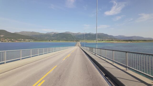 POV Of A Person In The Car Driving Through Hadselsbrua (Hadsel Bridge) Connecting Langoya and Boroya In Norway.