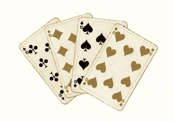 A hand of vintage playing cards showing four of the same value isolated on a white background.