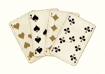 A hand of vintage playing cards showing four of the same value isolated on a white background.