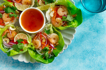 savory shrimps, rice noodles and vegetables  lettuce wraps