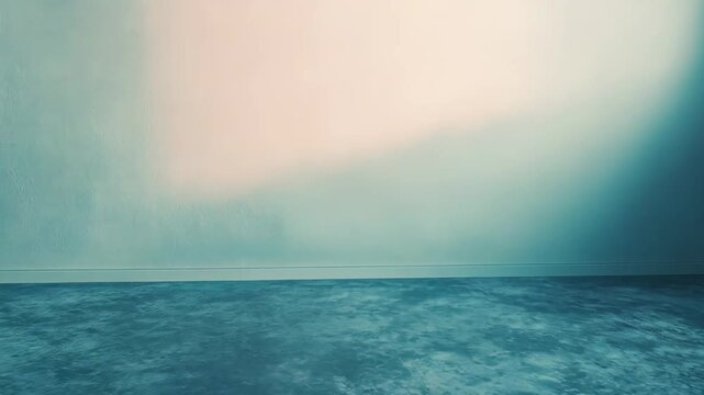 Minimalist interior displaying textured walls and a wet look concrete floor, filled with soft, warm light from an unseen window creating a serene and vast empty space