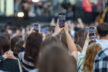 Crowd Recording Live Concert Performance On Multiple Smartphones