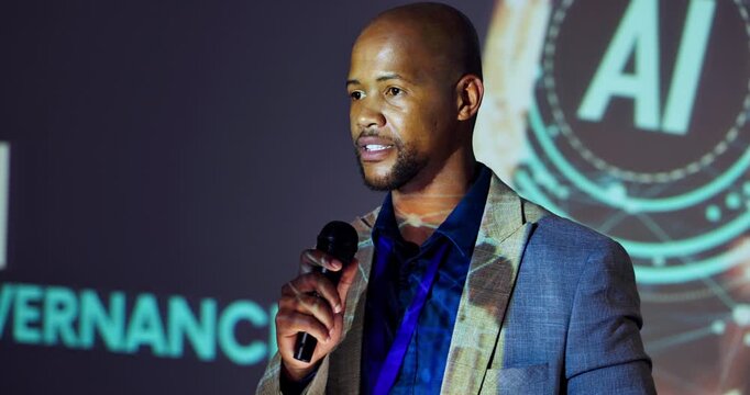 Stage, man and business speaker in seminar for ai data governance, ethical guidelines and training conference. Professional, black person or discussion with mic in international summit for compliance