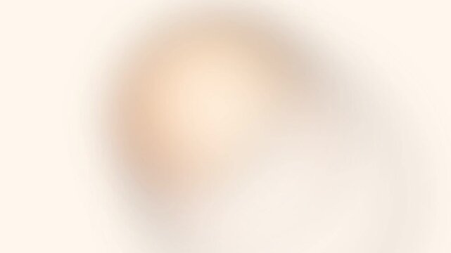 Soft Light Cream and Orange Abstract Blur Background with Gentle Bokeh Effect