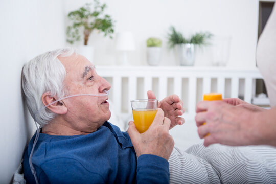 Wife taking care of her ill husband