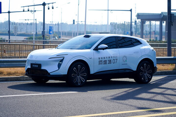 Obraz premium Chinese brand cars using Huawei's intelligent driving system are currently undergoing testing and trial drives.
