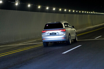 Obraz premium Chinese brand cars using Huawei's intelligent driving system are currently undergoing testing and trial drives.