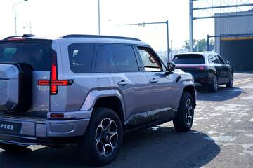 Obraz premium Chinese brand cars using Huawei's intelligent driving system are currently undergoing testing and trial drives.