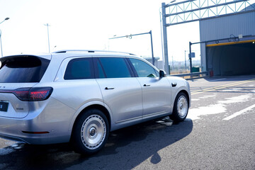 Obraz premium Chinese brand cars using Huawei's intelligent driving system are currently undergoing testing and trial drives.