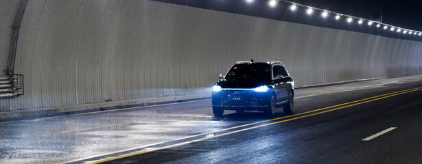 Obraz premium Chinese brand cars using Huawei's intelligent driving system are currently undergoing testing and trial drives.