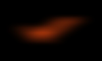 Abstract warm orange light leak on black background, soft glowing blurred lens flare effect.
