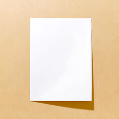 A single sheet of bright white paper casts a soft shadow on a warm, textured tan background. Perfect for minimalist design concepts and mockups.