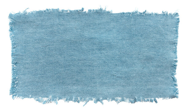 Piece of torn denim on a white background. Denim texture