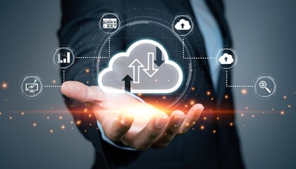 Fototapeta premium Businessman hand holding virtual cloud computing icon with artificial intelligence text, digital data storage technology concept and future smart network server infrastructure innovation.