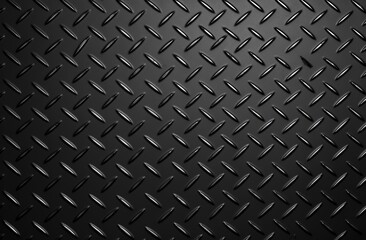 A close-up view of a textured metallic surface featuring diamond patterns, showcasing a sleek black finish and reflecting light subtly.