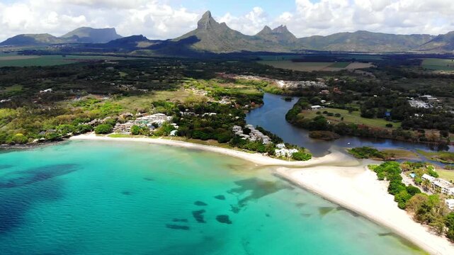 Tropical island Mauritius, coast with beach and mountains, aerial view