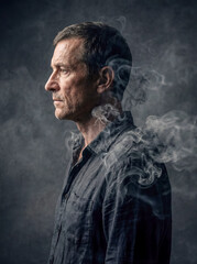 Abstract portrait of man with shirt dissolving into smoke swirls surreal conceptual art flow of emotions background copy space mystery ephemeral ghost