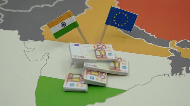 Flags of India and the European Union representing the EU-INDIA Free Trade Agreement or trade deal, exchange, and economic partnership, highlighting investment and financial collaboration with euro cu