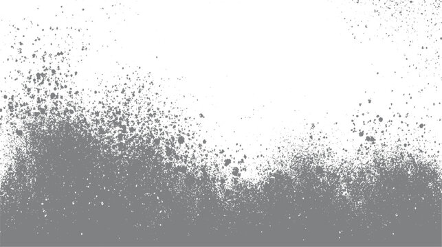 Gray spray paint splatters and dots on a white background with a dense cluster at the bottom