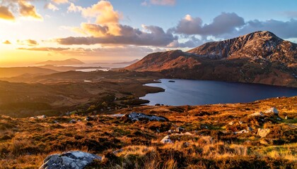 Golden Hour Sunset Over Scottish Highlands Loch and Mountains.