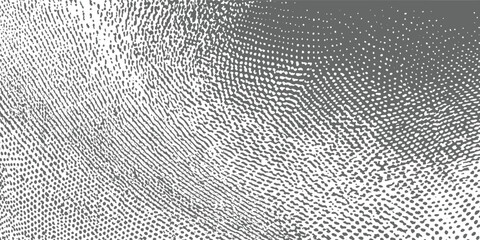 Abstract grayscale textured pattern of dots and lines creating a gradient effect