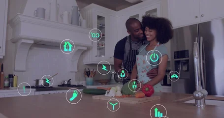 Selbstklebende Fototapeten Zu Kochen Preparing couple wearing aprons embracing at kitchen island, with cutting board and smart icons  © vectorfusionart