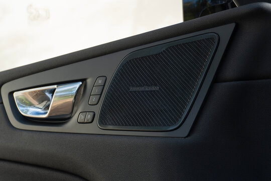 Volvo XC60 Harman Kardon door speaker close up, Premium audio system grille detail in car interior