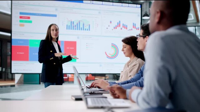 Financial Data Meeting In The Office Boardroom