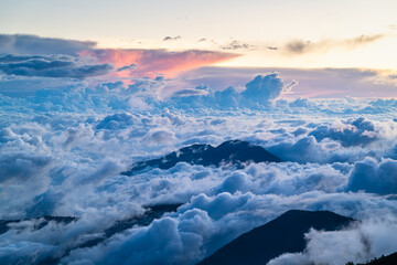Obraz premium Capture the stunning autumn beauty of Mountain Hehuan in Nantou, Taiwan, with rolling clouds under a clear blue sky. Perfect for nature and travel footage.
