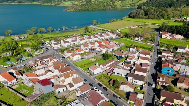 Aerial view of Sete Cidades and crater valley with rural houses and roads, Azores, Portugal.