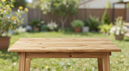 Naklejka premium Wooden table surface with blurred outdoor garden setting in the background