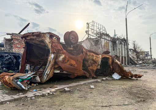 Rusted and mangled car wrecks near Azovstal steel works, Donetsk Oblast, Mariupol, Ukraine