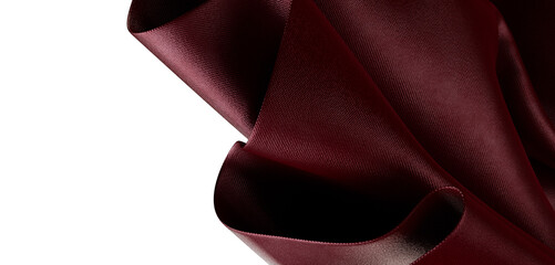 Close-up shot of luxurious maroon fabric, showcasing texture and folds. Perfect for design projects, textiles, and artis