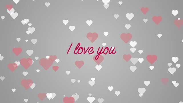 Red and white hearts that flying and flashing. I love you text with hand write effect on silver gradient background. Romantic video for valentine's day, couple in love, wedding, dating. 