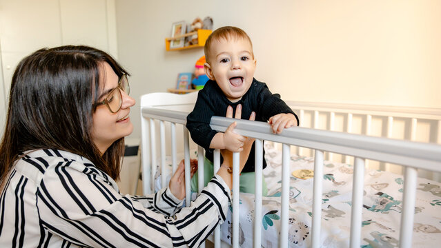 Baby bonding time at home with family
