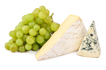 Wedge of soft cheese and blue cheese with a bunch of green grapes, isolated on white background