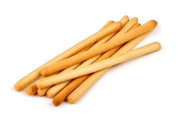 Pile of golden brown breadsticks, crunchy Italian snack, isolated on white background.