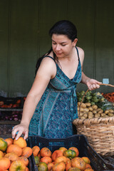 Woman shopping for fresh produce at local market